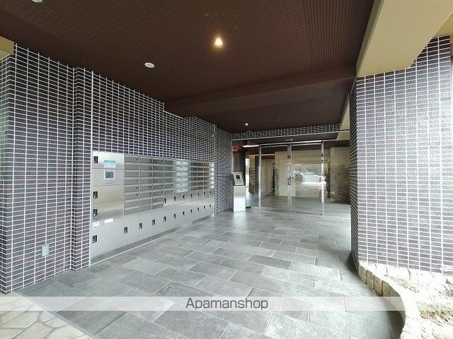 プレアデス千里山田の玄関写真