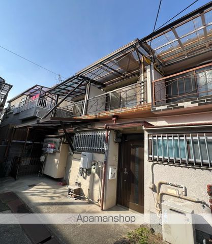 西野110-31テラスハウス 左の外観写真