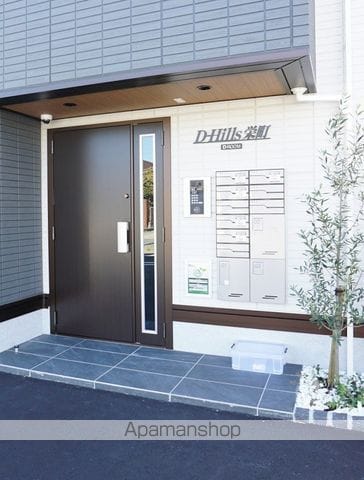 DーHILLS栄町の玄関写真