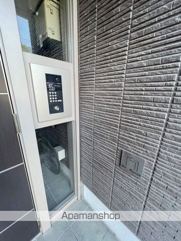 シャーメゾン純心電停前の玄関写真