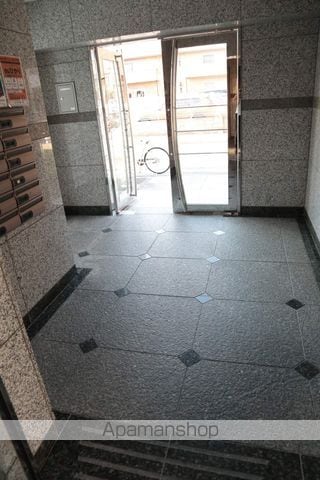 コウジィ−コート大南の玄関写真
