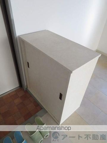 コスモリヴェール朝生田の内装写真