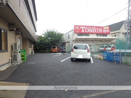 ファミール河内[1LDK/44.19m2]の駐車場2