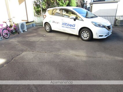 ビクトリースマイル壱番館[1K/18m2]の駐車場2