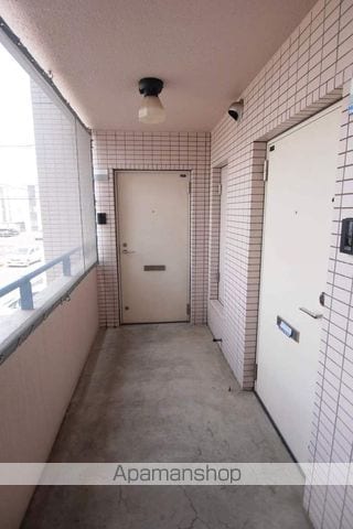 ビッグバーンズマンション北郷IIIBの玄関写真