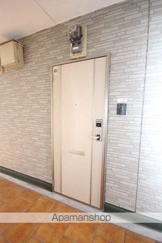 ガーデンヒルズ鷹尾の玄関写真
