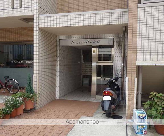 南区吉祥院定成町マンションの外観写真