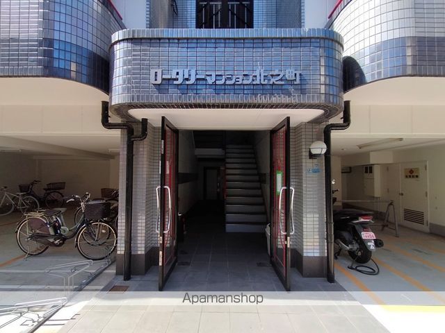 ロータリーマンション香里北之町の玄関写真