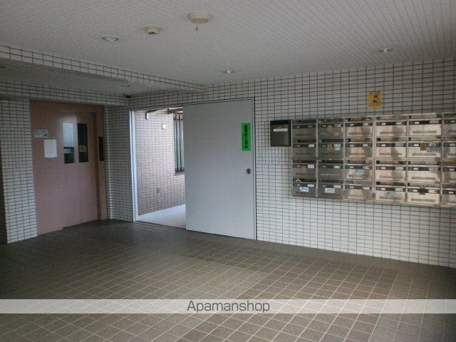 【調布市菊野台のマンションの写真】