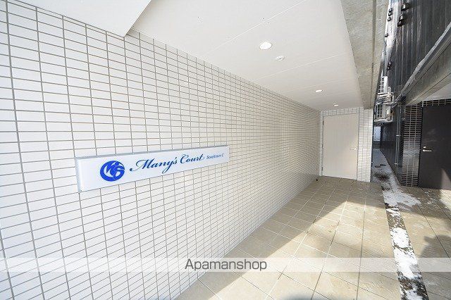 メニーズコート創成タウンC棟の玄関写真