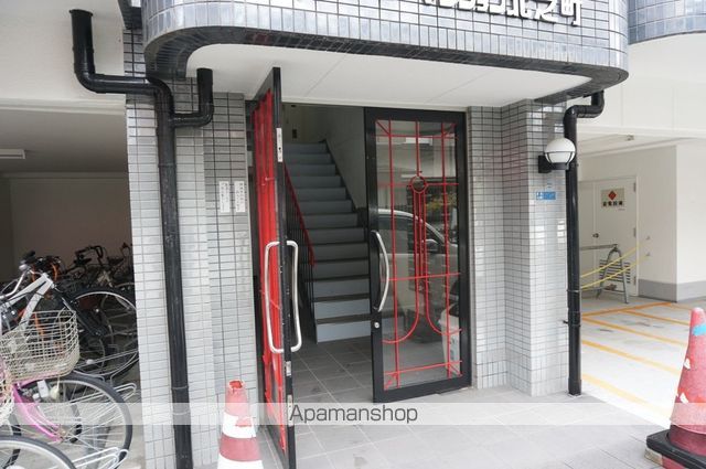 ロータリーマンション香里北之町の玄関写真