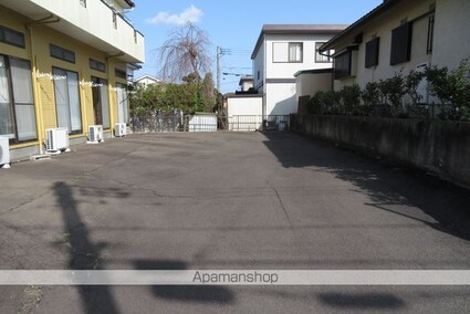 ビクトリースマイル壱番館[1K/18m2]の駐車場1