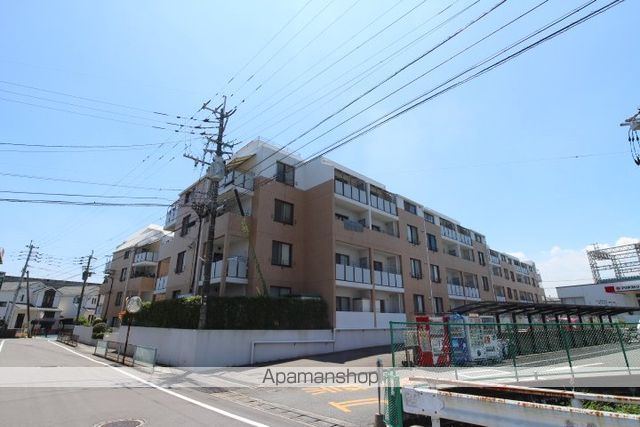 サンライフ小郡コートビレッジマンションJ・K棟の外観写真
