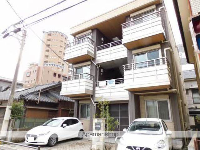 シャーメゾン純心電停前の玄関写真