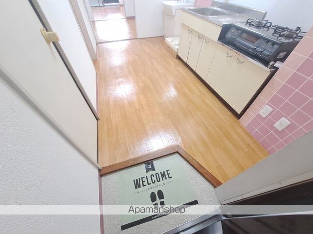 ラッセルスクエア松山市駅　Ａ・Ｂ棟[2K/36.5m2]の玄関