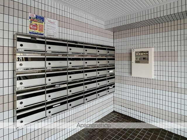 リブロイヤル石引IIの玄関写真