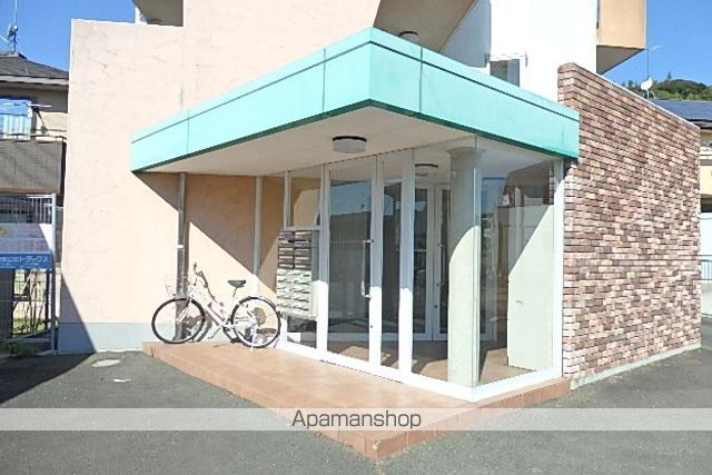 掛川市 4階建 築23年の玄関写真