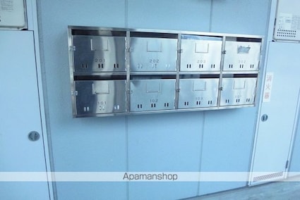 プロムナード万々[3LDK/64.65m2]のエントランス