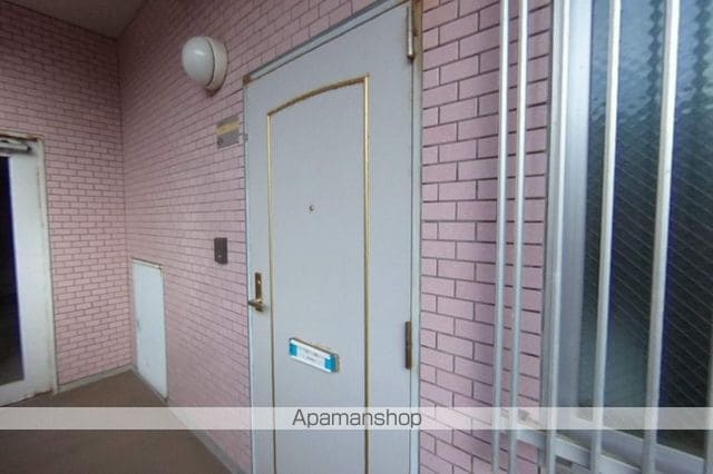 エクセリア駅南の玄関写真