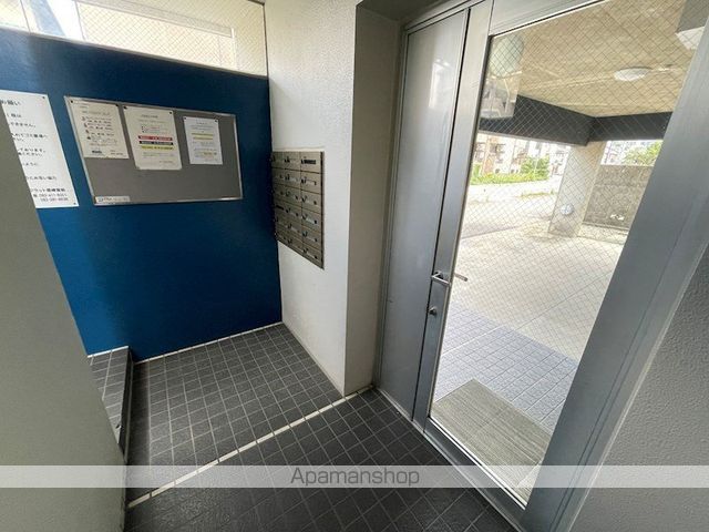 Mフラット筥崎宮前の玄関写真