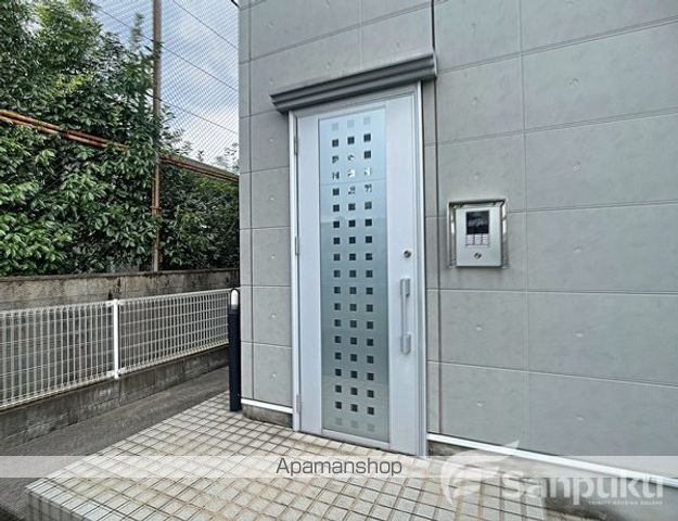 レオネクスト松山インターIIIの玄関写真