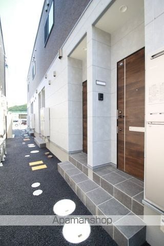 アイタウン庭瀬A棟の玄関写真