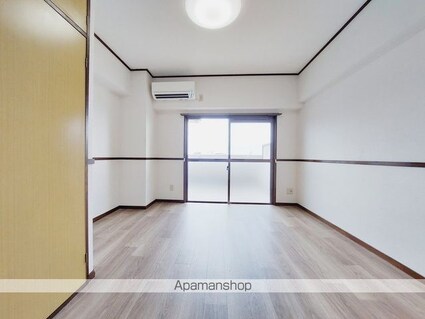 愛媛県松山市南久米町[1R/23.4m2]のリビング・居間