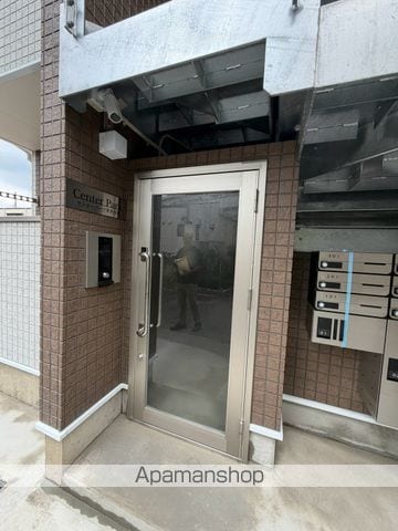 センターパーク本木西町の玄関写真