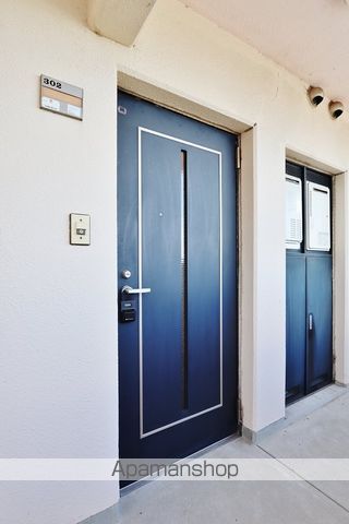 グローリア カーザの玄関写真