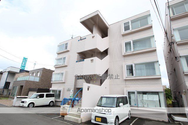 ビッグバーンズマンション北郷IIIAの外観写真