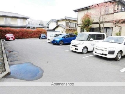 ＢＲＩＣＫ　ＨＯＵＳＥ[1LDK/33.39m2]の駐車場2