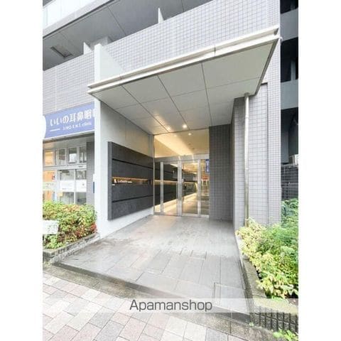 オーパスホームズ千駄木の玄関写真