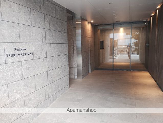 レジデンス鶴間駅前の玄関写真