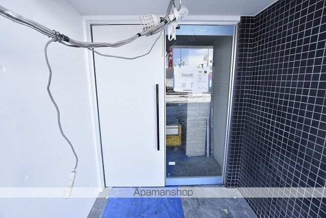 札幌市南北線 麻生駅 徒歩7分 4階建 築9年の玄関写真