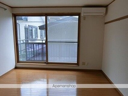 岩手県盛岡市前九年３丁目[1K/27.74m2]のリビング・居間