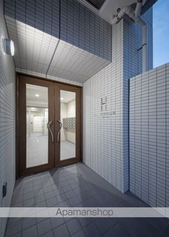ライトヒルズ駅北の玄関写真