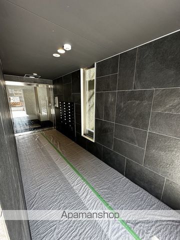 プレミアムソレイユ塚本駅前の玄関写真