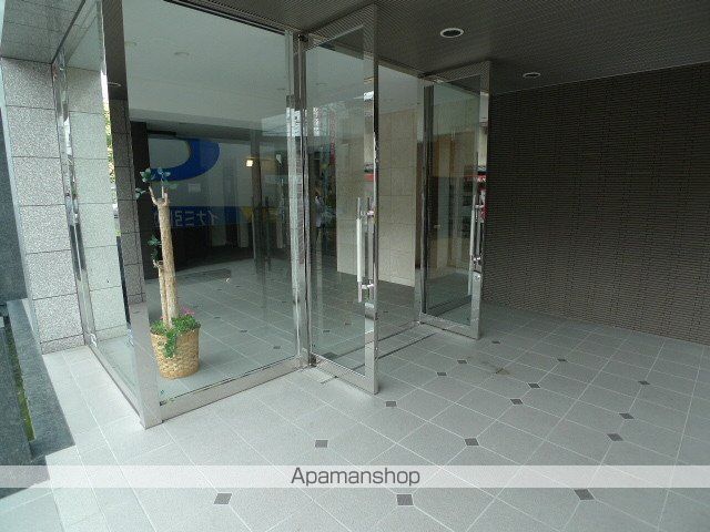 アルファステイツ市駅西の玄関写真