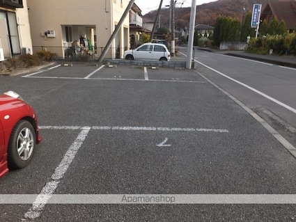 レオパレスＥａｓｅ　ｍｏｒｅ[1K/23.18m2]の駐車場