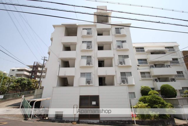 千里山西コーポ第3ビルの外観写真