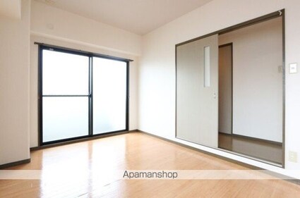 ＧＲＡＮＤ　ＣＯＭＦＯＲＴ[1LDK/50.89m2]のリビング・居間