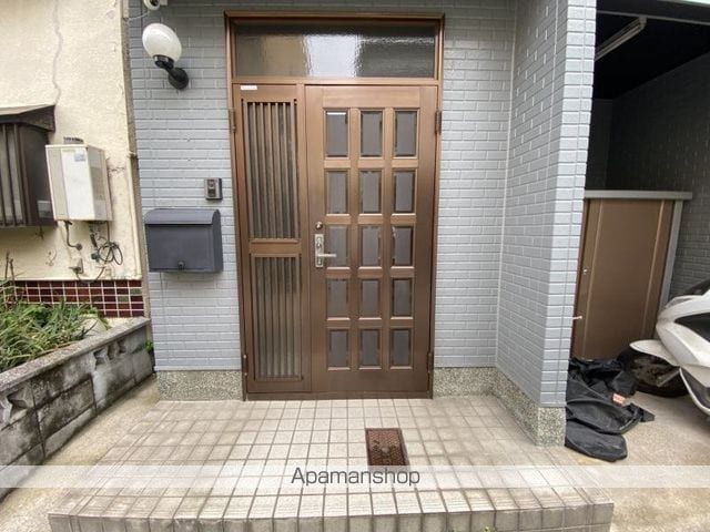 近鉄南大阪線 河内天美駅 徒歩8分 3階建 築36年の玄関写真