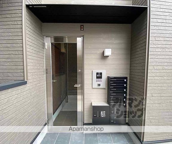 ハーモニーテラス太秦安井辻ノ内町の玄関写真