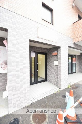 CALORE栄町の玄関写真