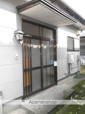 都城市 1階建 築31年の玄関写真