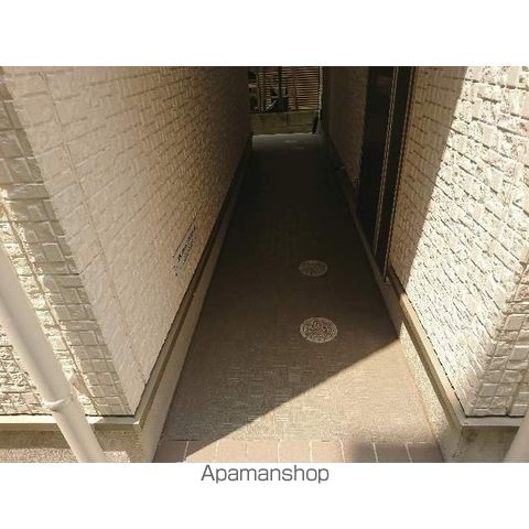 メゾン・プーラ豊島の玄関写真
