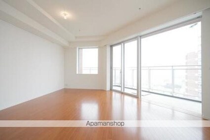 ユニゾンタワー[1LDK/52.75m2]のリビング・居間