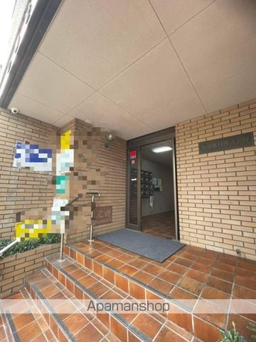 米田ビルの玄関写真