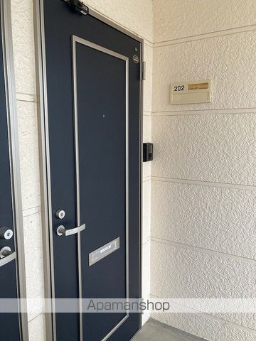 サンフィルド本馬越の玄関写真