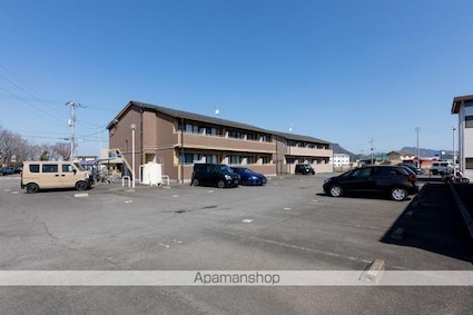 ウッドネスト春日１．２．３[1K/26.24m2]の駐車場